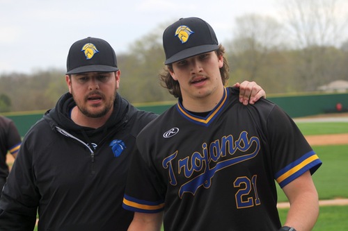 NIACC's Jaiden Mollett  talks with pitching coach Doug Gove during a game earlier this season.
