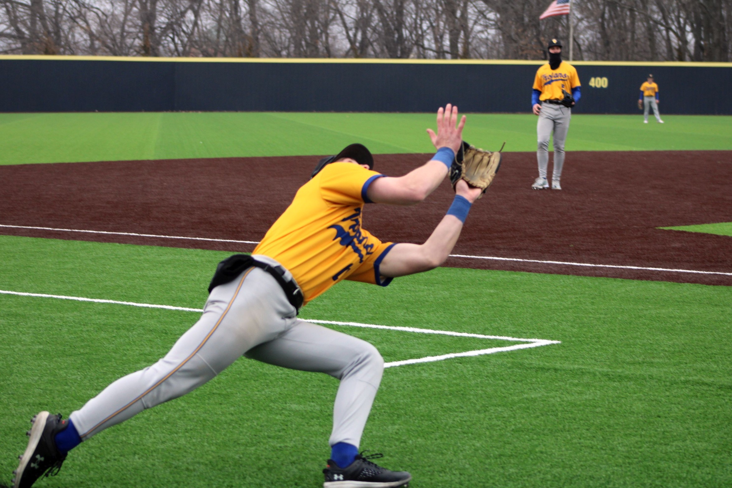 NIACC third baseman Colin Evers catches a pop fly in foul territory in the second game of Sunday's doubleheader against Johnson County CC.