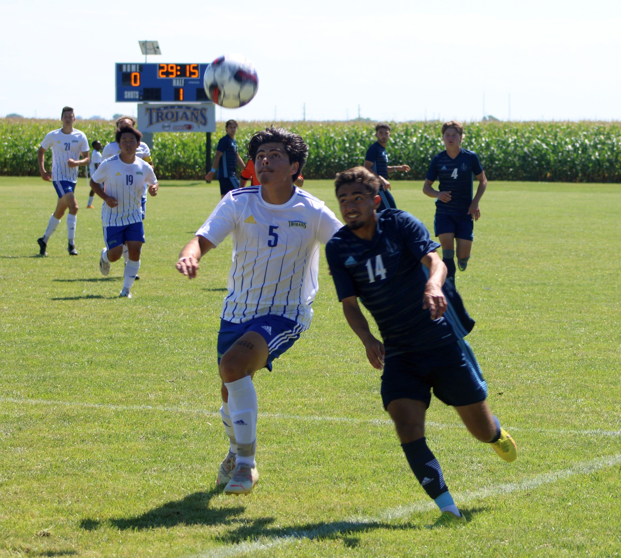 NIACC's Carlos Garcia (left) battles for the ball during the first half of Saturday's home match against Iowa Central.