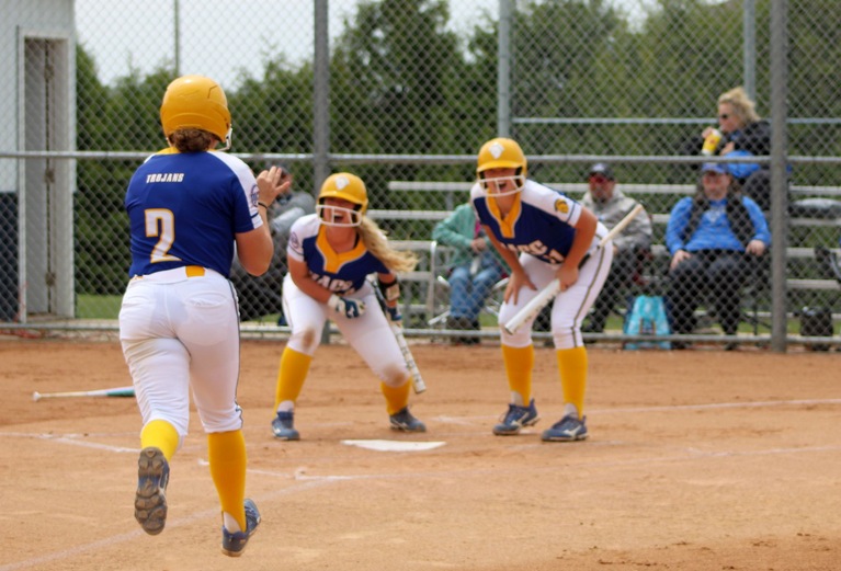 NIACC's Katy Olive approaches home plate after hitting a leadoff home run in Monday's regional title game against DMACC.