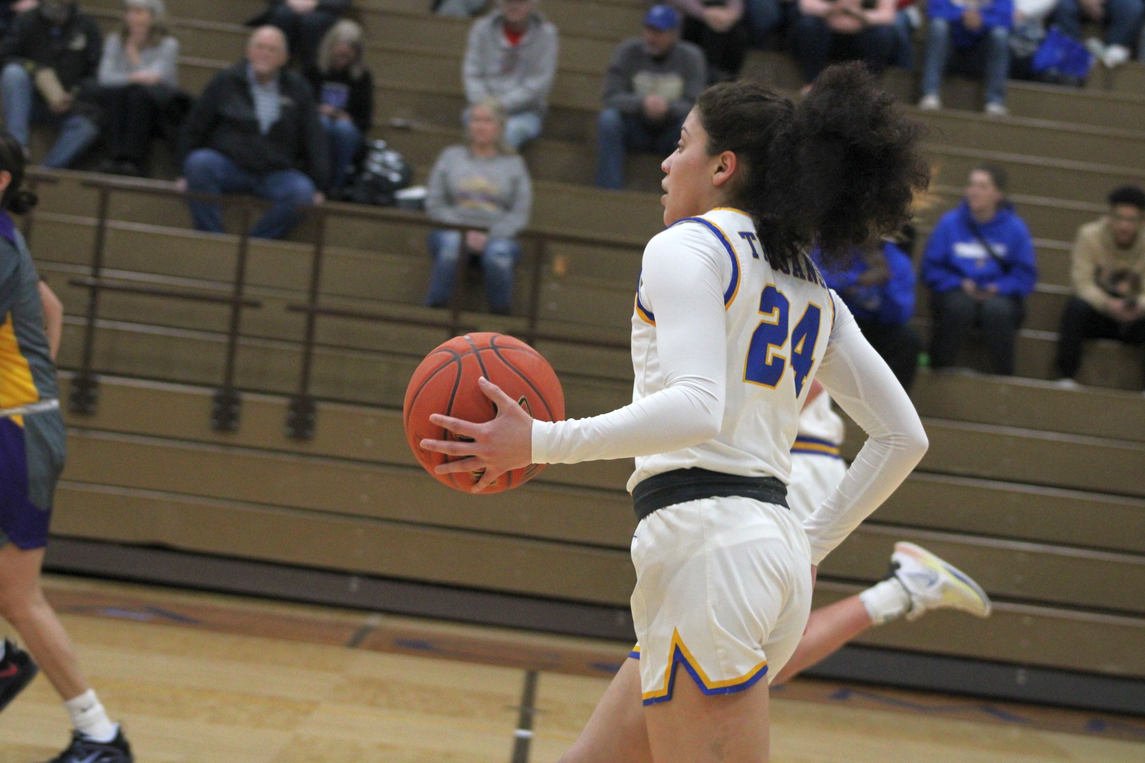 NIACC sophomore Audrey Martinez-Stewart moves the ball up the court in Wednesday's game against Ellsworth.