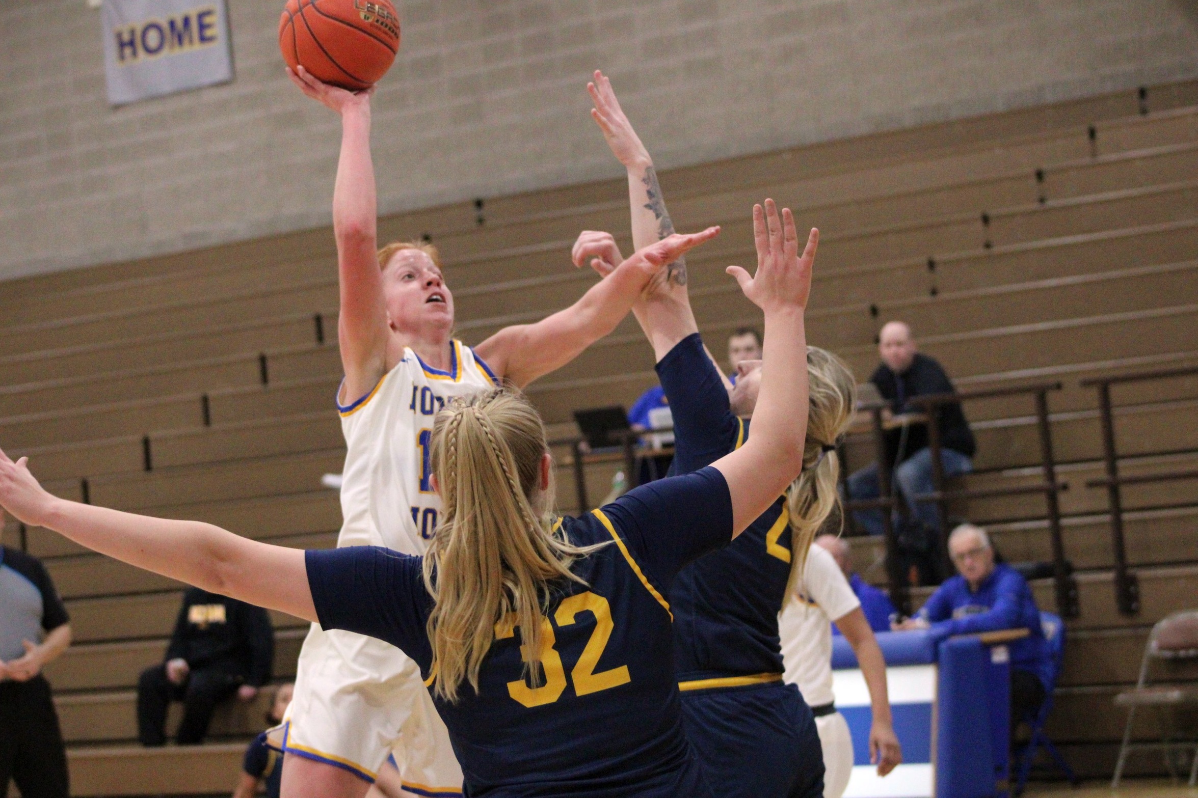 NIACC's Jackie Pippett shoots over the Iowa Lakes defense in a game in the 2022-23 season.