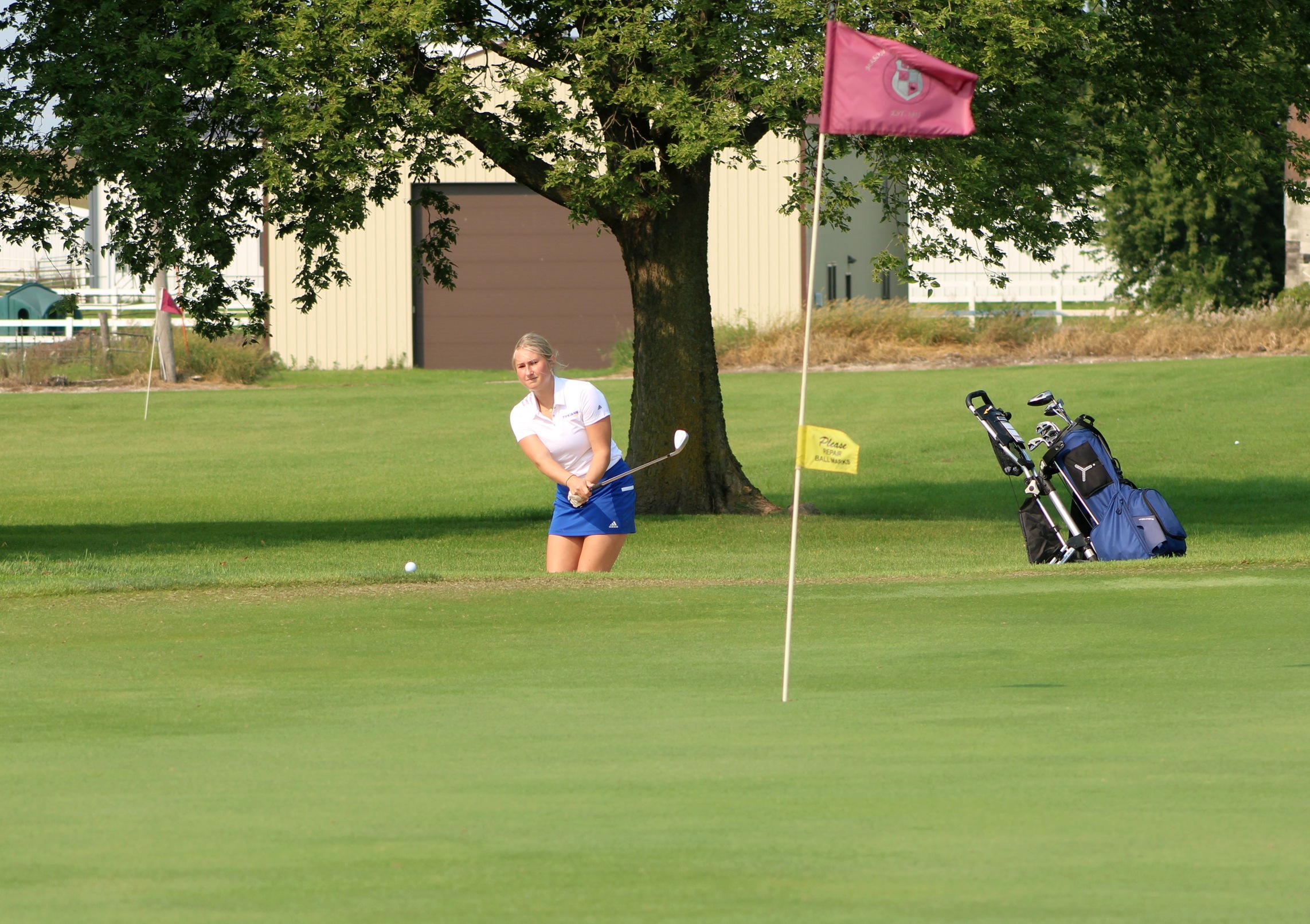 NIACC's Kirsten Boerjan chips onto the green on hole No. 9 at the NIACC Fall Golf Invitational on Thursday at the Mason City Country Club.