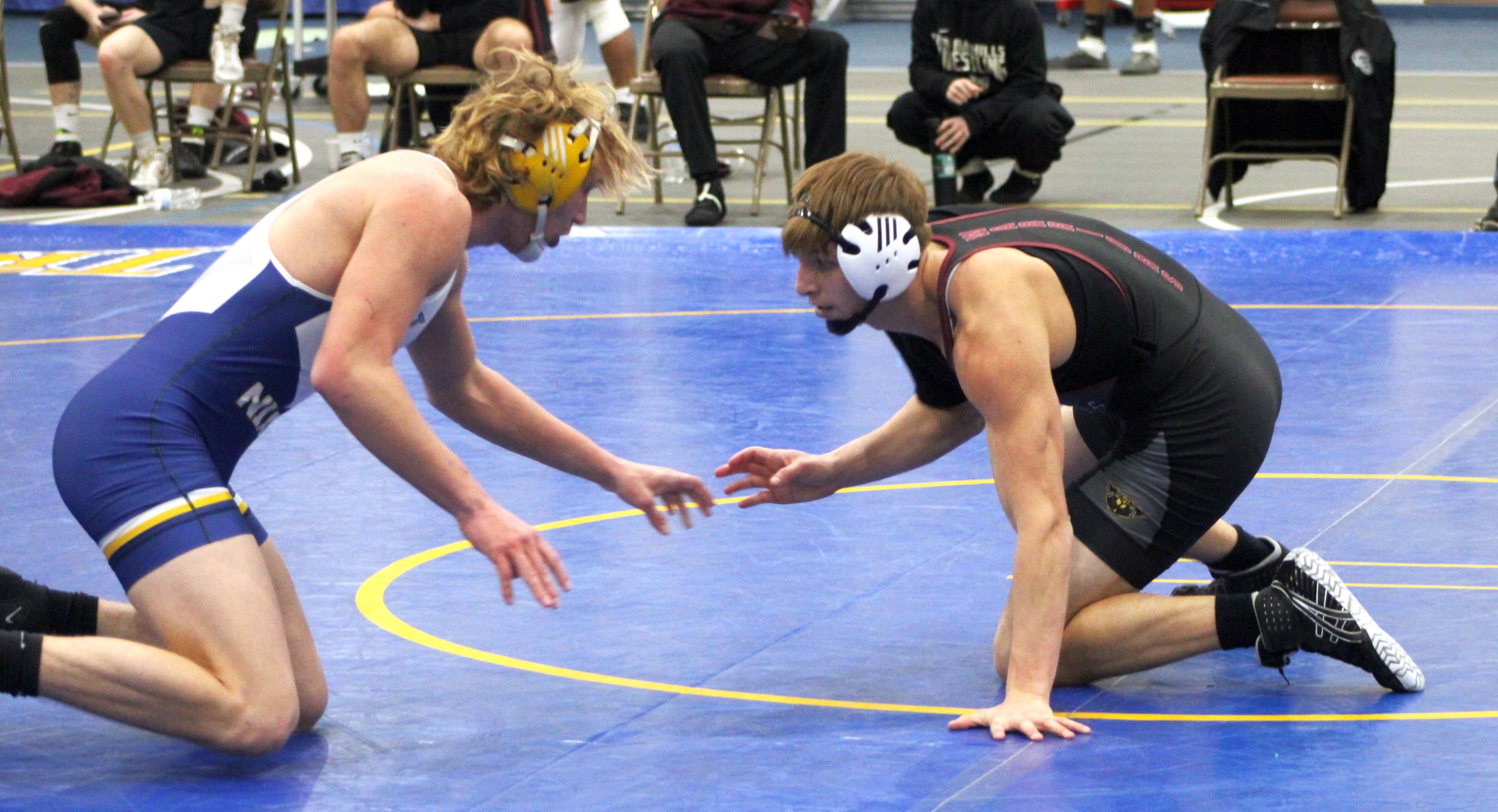 NIACC's Cale Luthens battles Indian Hills' Lucas Henderson in their 174-pound match on Wednesday.