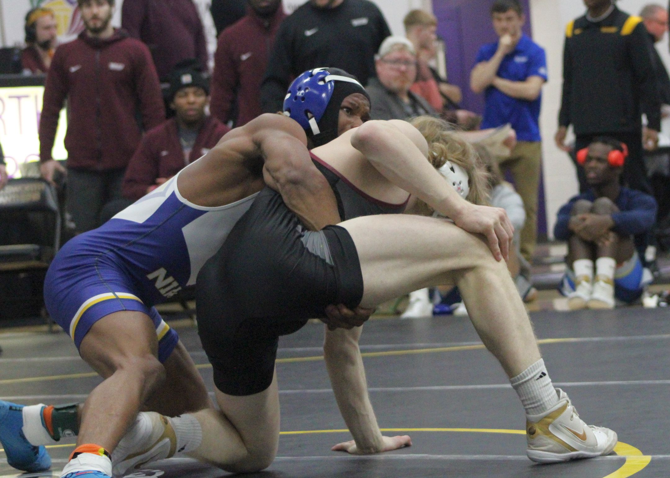 NIACC's Isaac Church controls Indian Hills' Matthew Lewis in their 141-pound semifinal match Sunday.