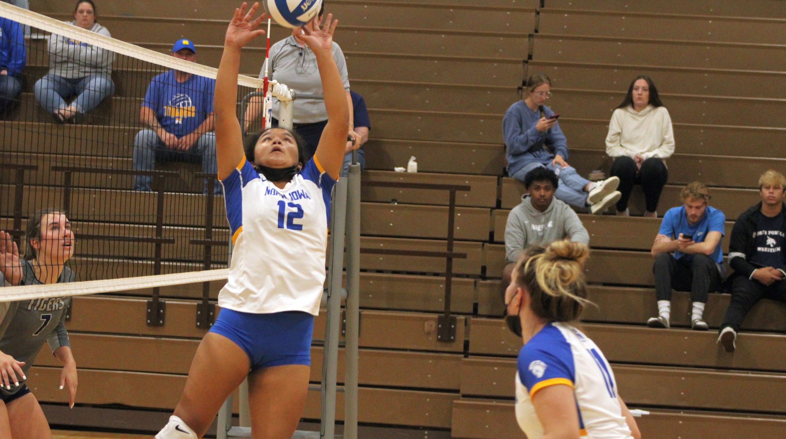 NIACC's Iwalani Beltran sets the ball during Friday's match against Marshalltown CC.