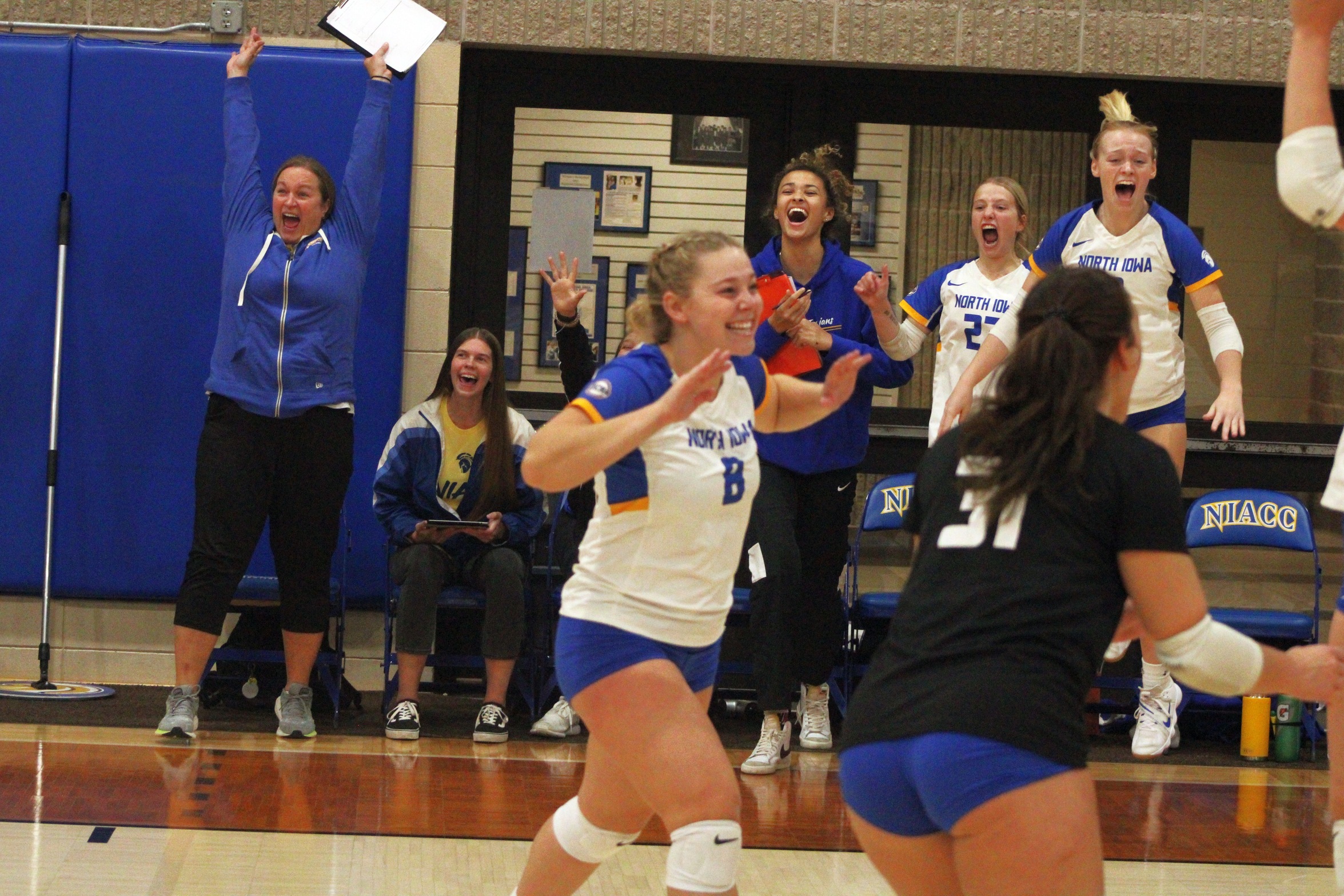 NIACC celebrates its 3-2 win over Ellsworth on Saturday at the NIACC volleyball tournament.