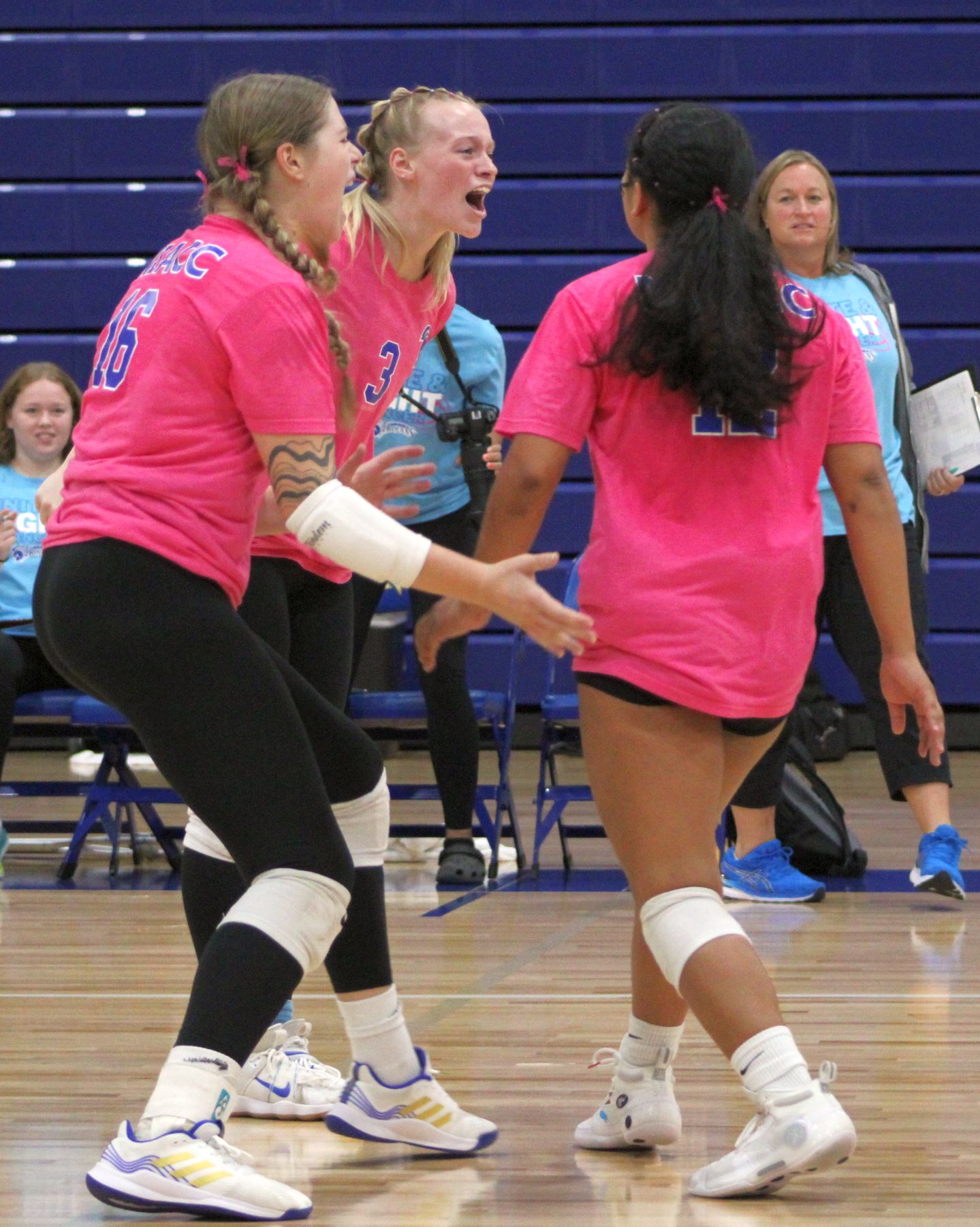 NIACC celebrates a point late in set 4 during the Trojans' 3-1 win over Iowa Lakes Thursday in the NIACC gym.