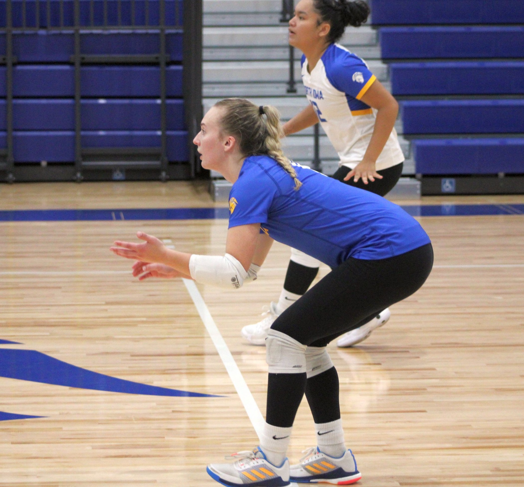 NIACC's Kennedy Schwiesow gets ready for the serve in Saturday's match against Marshalltown CC.