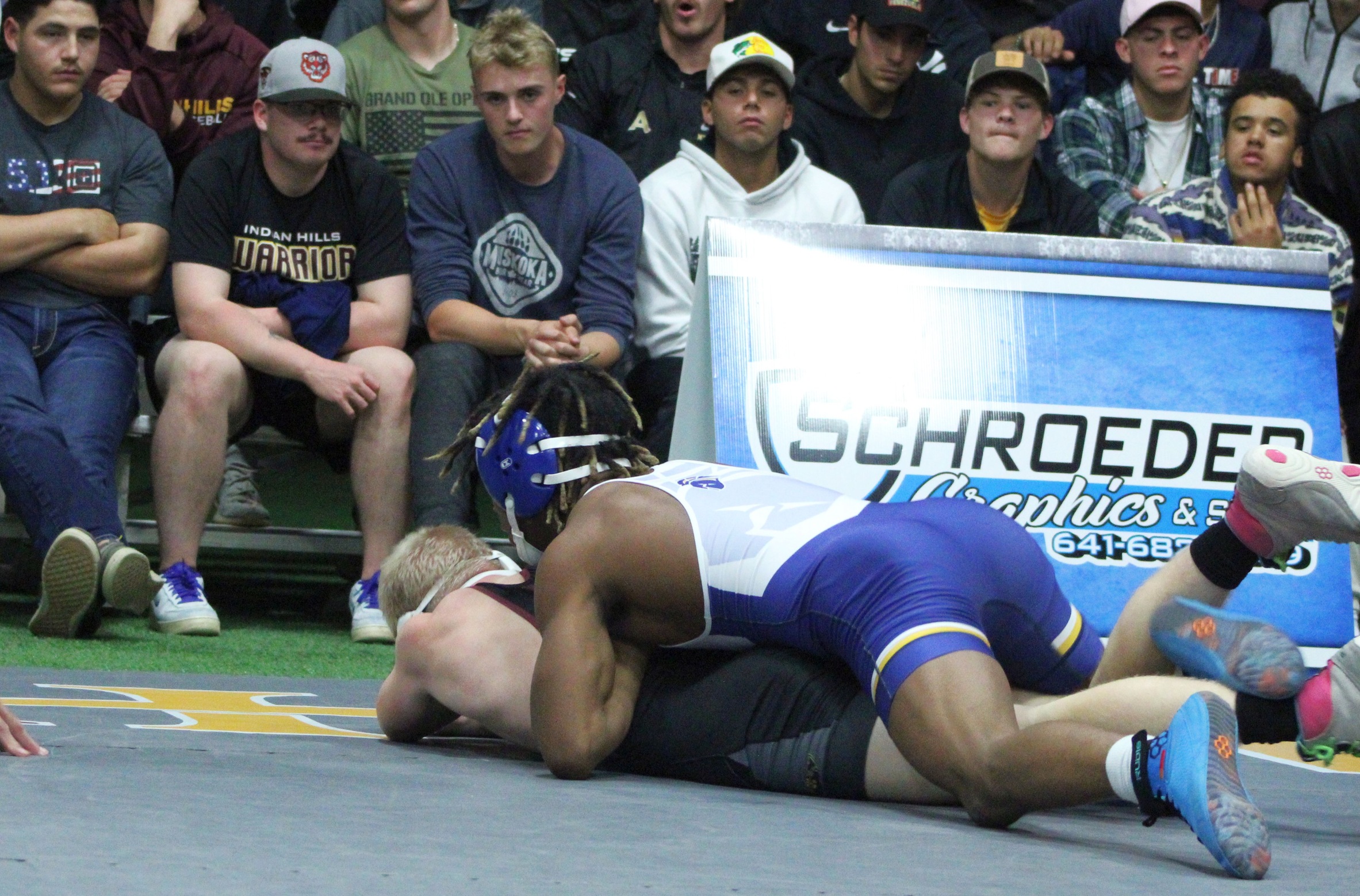 NIACC's Isaac Church controls Dawson Townsend in their 141-pound match Tuesday in Centerville.