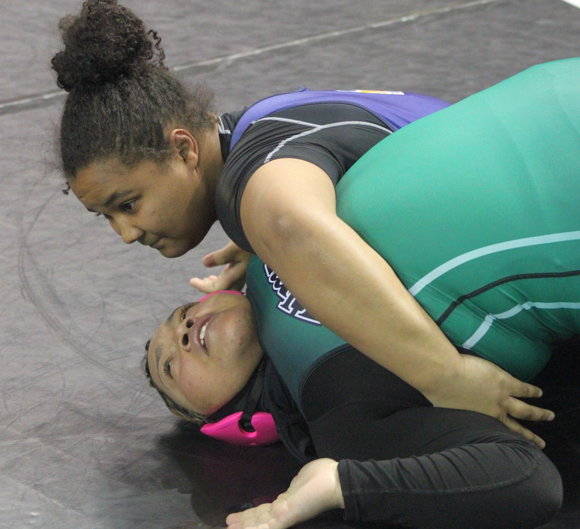 NIACC's Valerie Smith pins Umpqua's Leilani Holley in their 235-pound quarterfinal match at the national tournament Friday.